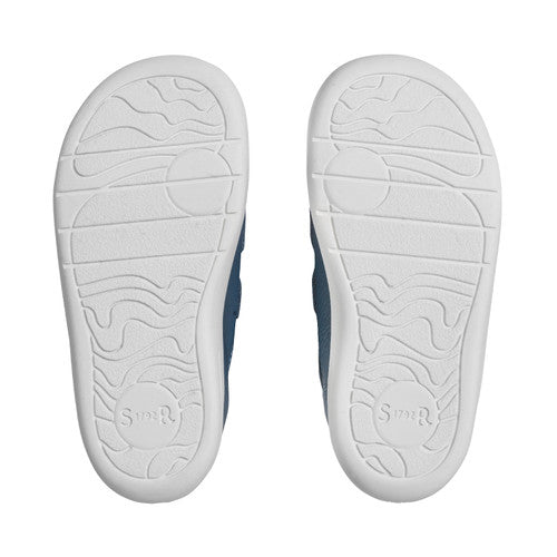 A boy's casual shoe by Start-Rite, style Playhouse, in blue leather with tan trim on white sole unit with double velcro fastening. View of soles of a pair.