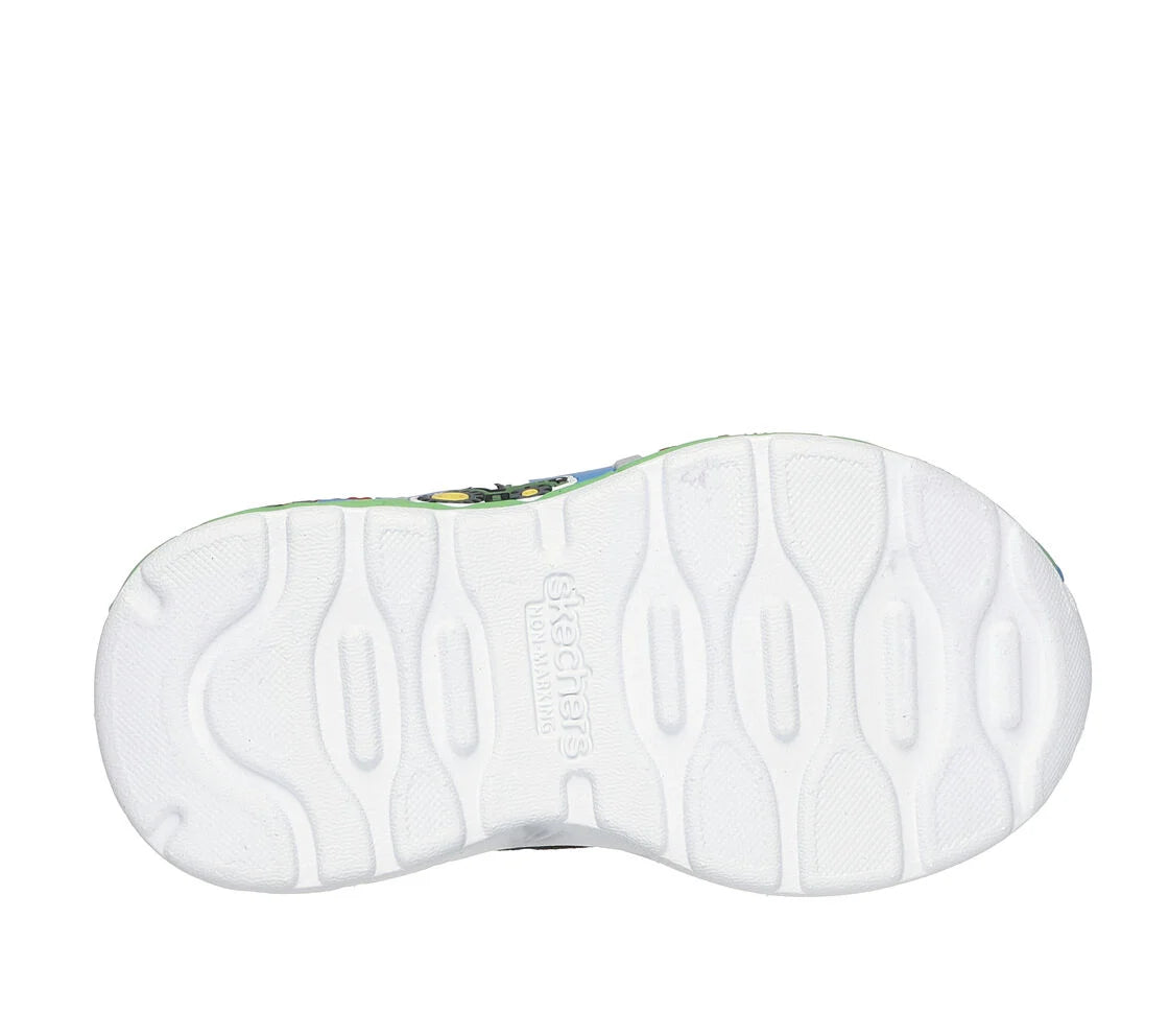 A girls trainer by Skechers, style Play Scene Barn Squad, in green and black set on blue sole with farm yard motifs. Velcro and elastic lace fastening. Sole view.