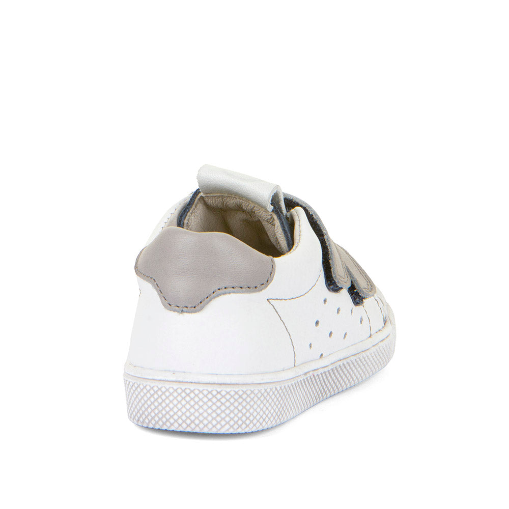 A boys casual shoe by Froddo, style Rosario G2130316-41, in white and blue leather with grey straps and trim. Toe bumper and velcro fastening. Angled back view.