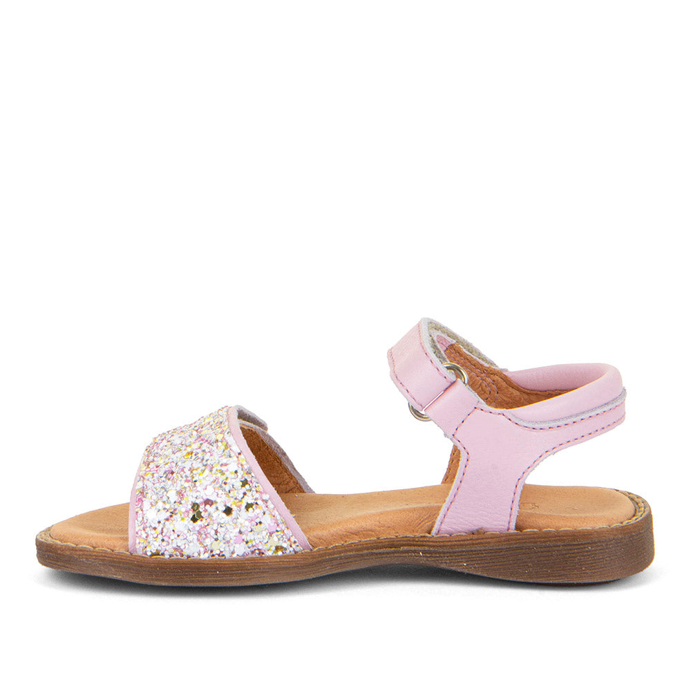 A girls open toe sandal by Froddo,style Lore Sparkle G3150249-15 in pink leather with glitter velcro strap and velcro ankle fastening. Left side view.