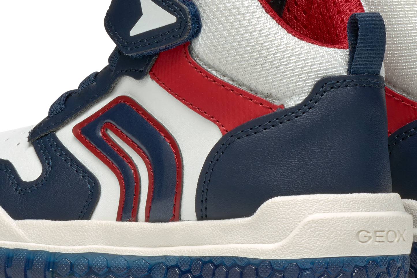 A boys high-top by Geox, style Buzzerlight, in navy, white and red, Velcro fastening. Close up view.