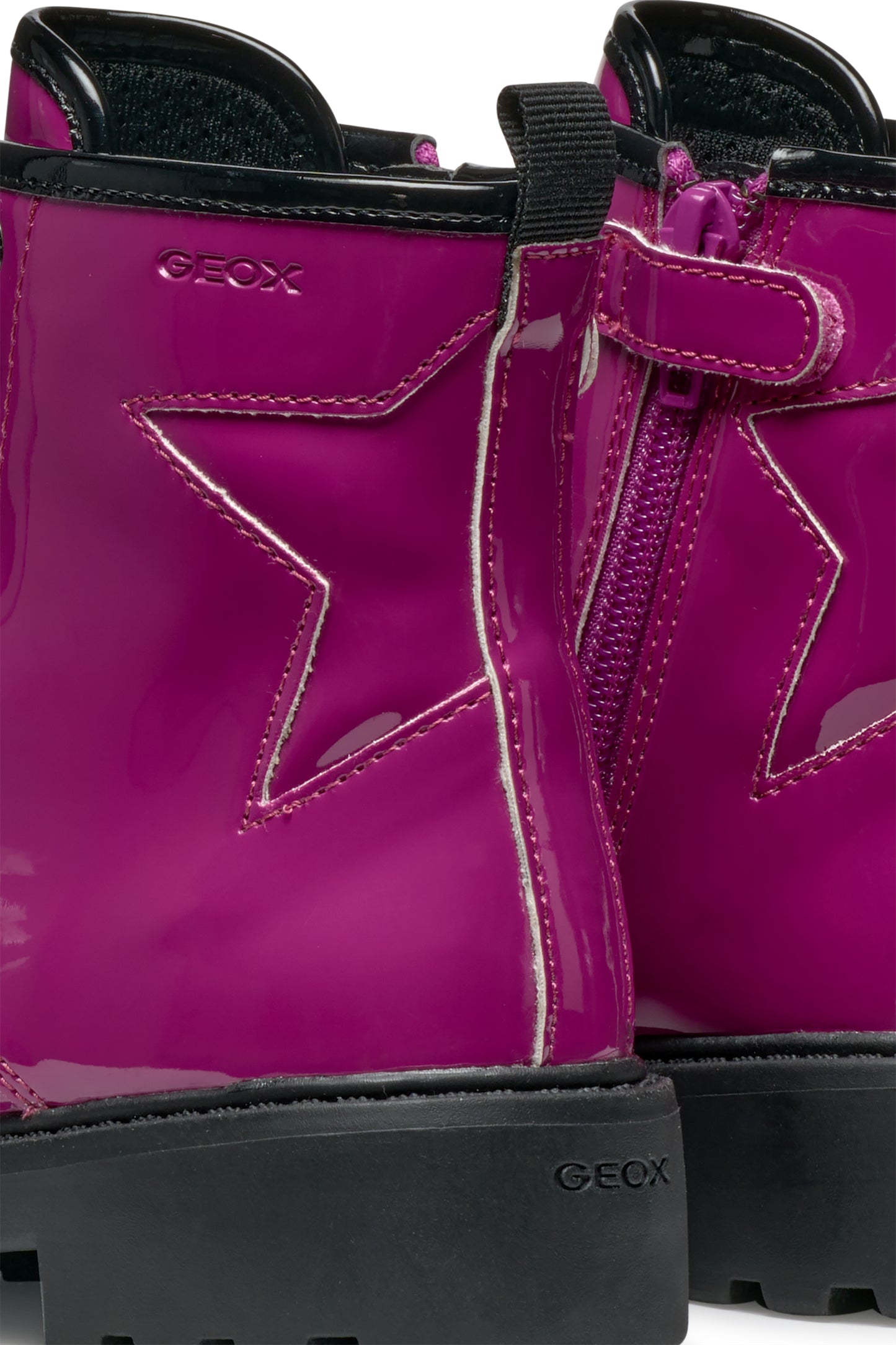 A girls boot by Geox, style Casey Girl in bright pink patent, lace/ inside zip fastening. Close up of star detail.