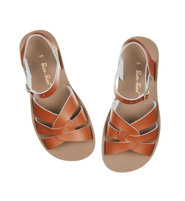 A unisex sandal by Salt Water, style Swimmer in tan, buckle fastening. Above view of a pair.