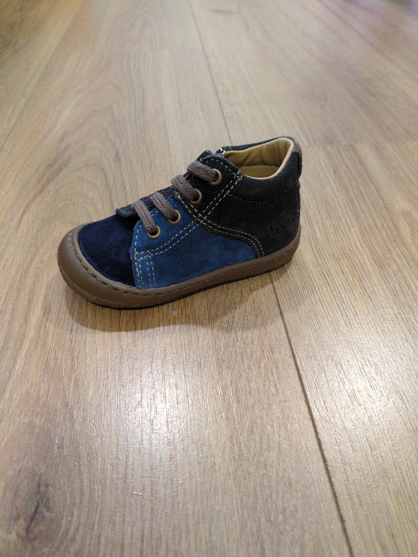 A lace/zip boys first shoe by Bopy, style Jordan in blue multi / brown.Left side view.