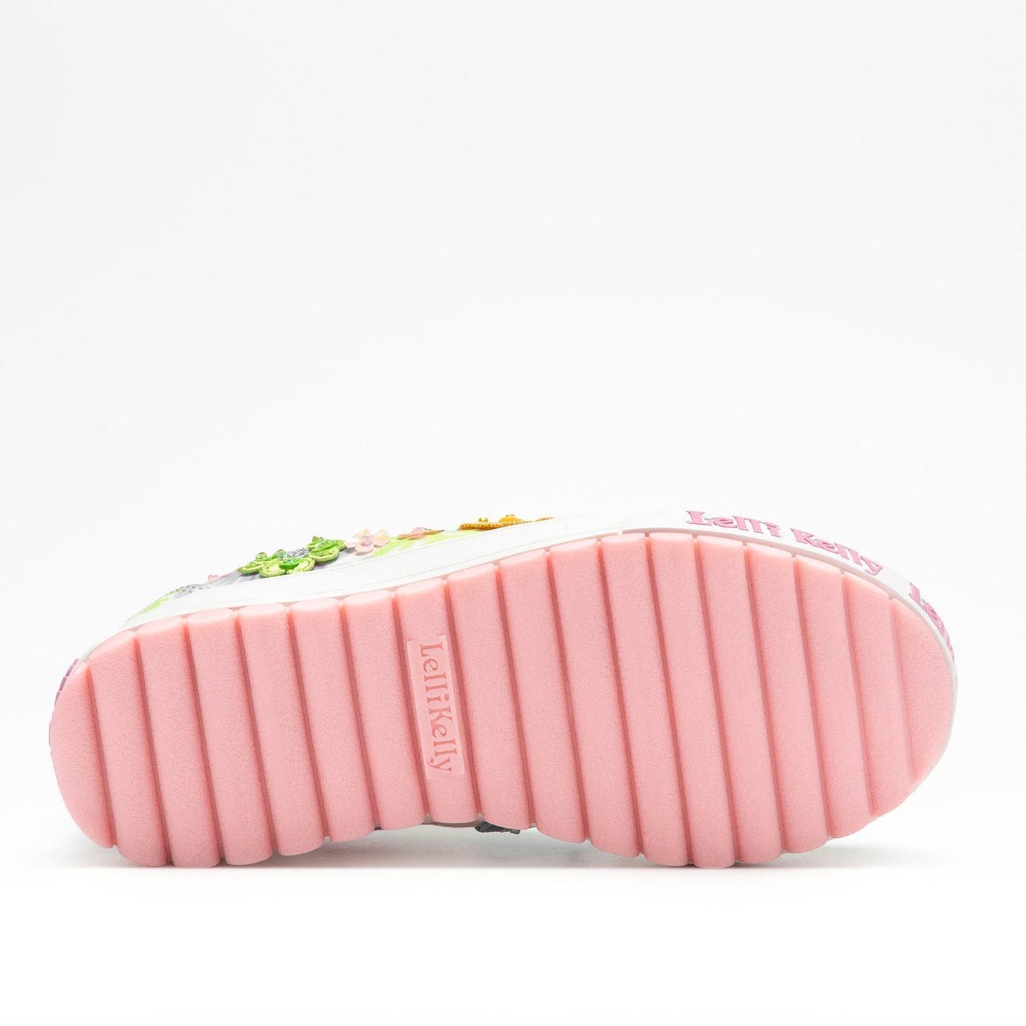 A girls embellished canvas Mary Jane by Lelli Kelly, style LKED4911 Eloise Dolly, in white multi with velcro fastening. View of pink sole.