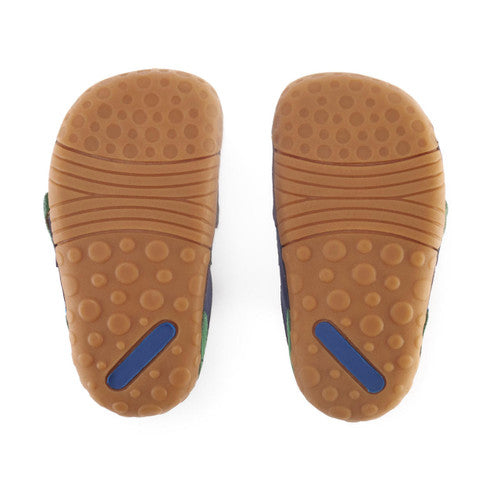 A pair of boys pre walkers by Start Rite and JoJo Maman Bebé collaboration ,style Companion,in Navy multi with dinosaur velcro fastening. Sole view.