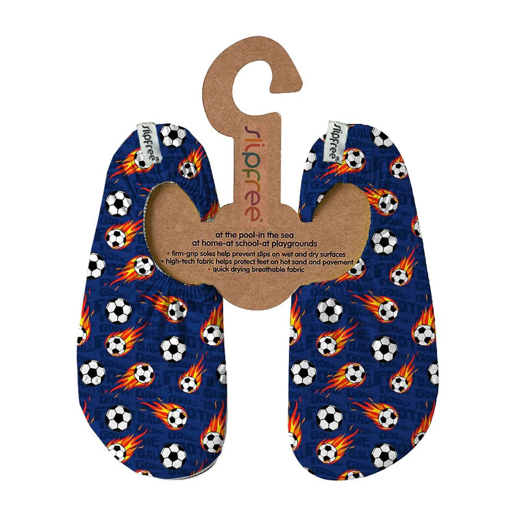 A non slip swim shoe by Slipfree, style Messi, in blue with multi football print. Front view.