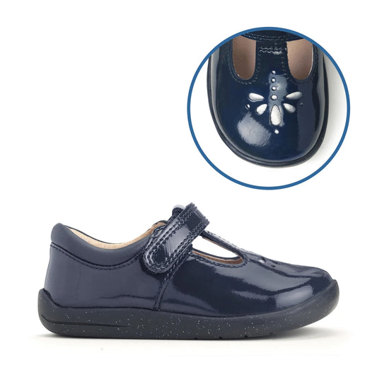 A girls t-bar shoe by StartRite, style Puzzle in patent navy, with flower design on the front and glitter in a black sole. Right side view with smaller image showing close up of front of the shoe.