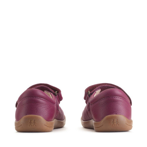A girls Mary Jane shoe by Start Rite, style Fairy Tale, in plum leather with flower detail and velcro fastening. Heel view.