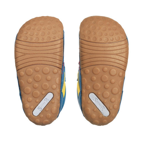 A pair of boys pre-walkers by Start-Rite, style Little Smile. In blue leather multi with double velcro fastening and toe bumper. View of soles.