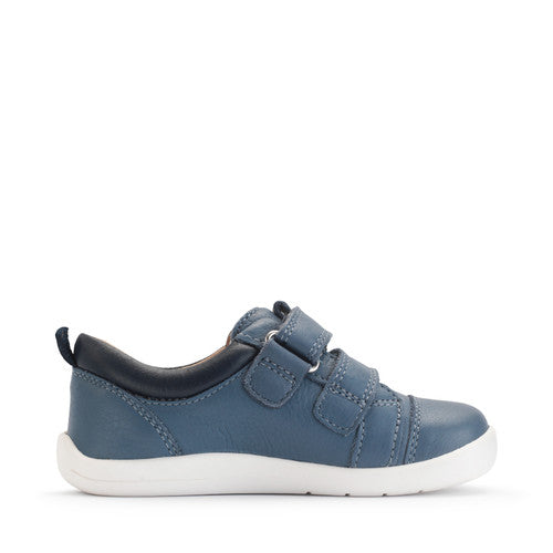 A boy's casual shoe by Start-Rite, style Playhouse, in blue leather with tan trim on white sole unit with double velcro fastening. Left side view.