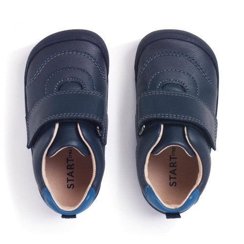 A boys first shoe by Start-Rite, style Summit, in navy with royal blue stitching and velcro fastening. Top view of the pair.