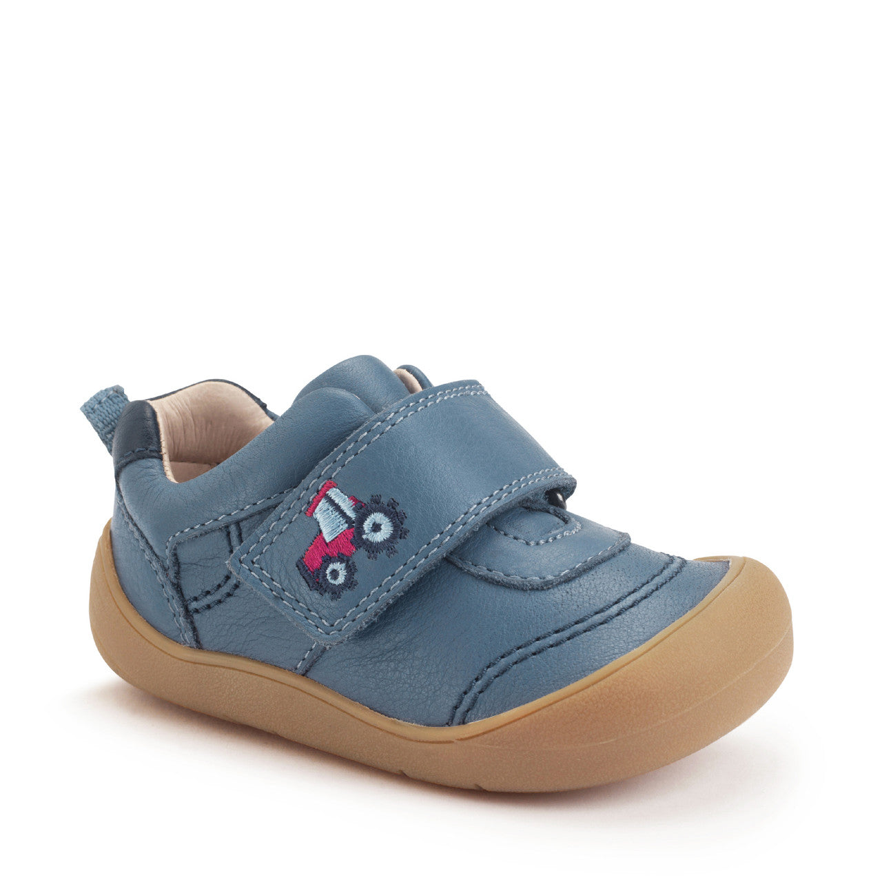A boys casual shoe by Start-Rite, style Harvest, in blue with heel and toe bumpers and red tractor detail to the velcro fastening. Angled right side view.