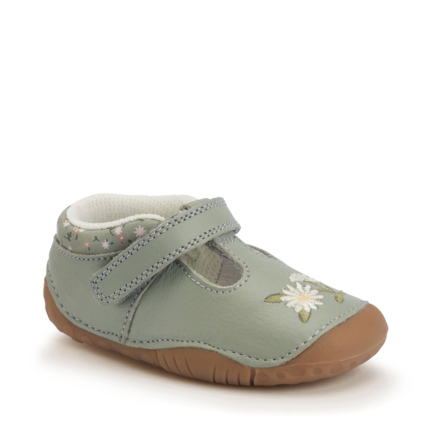 A girls pre-walker shoe by StartRite, style Squish in dusky green with flower detail on front and ankle, with t-bar velcro strap. Angled right side view