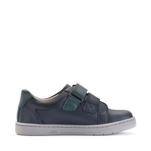 A boys casual school shoe by Start Rite, style Explore, in navy and teal leather with double velcro fastening. Left side view.