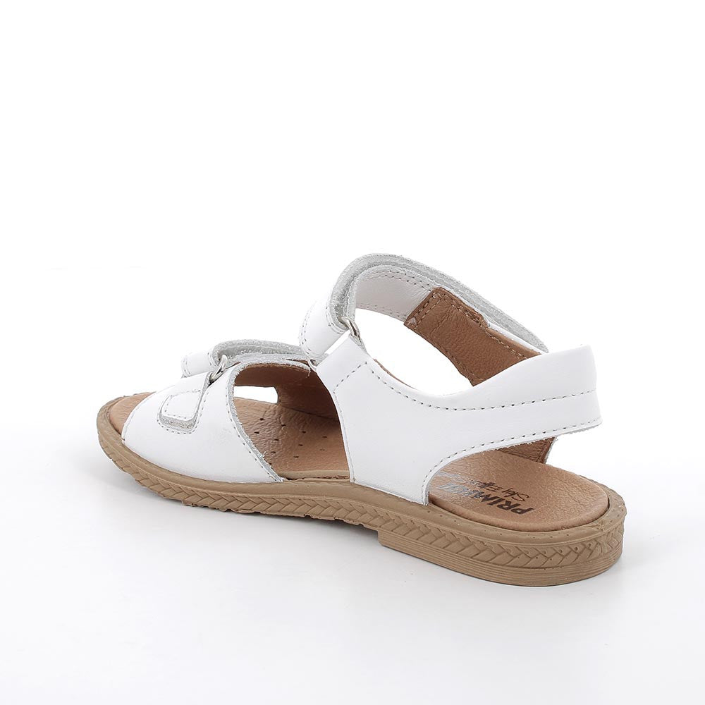 A girls open to sandal by Primigi, style Amelia in white, velcro fastening. Right inner side view.