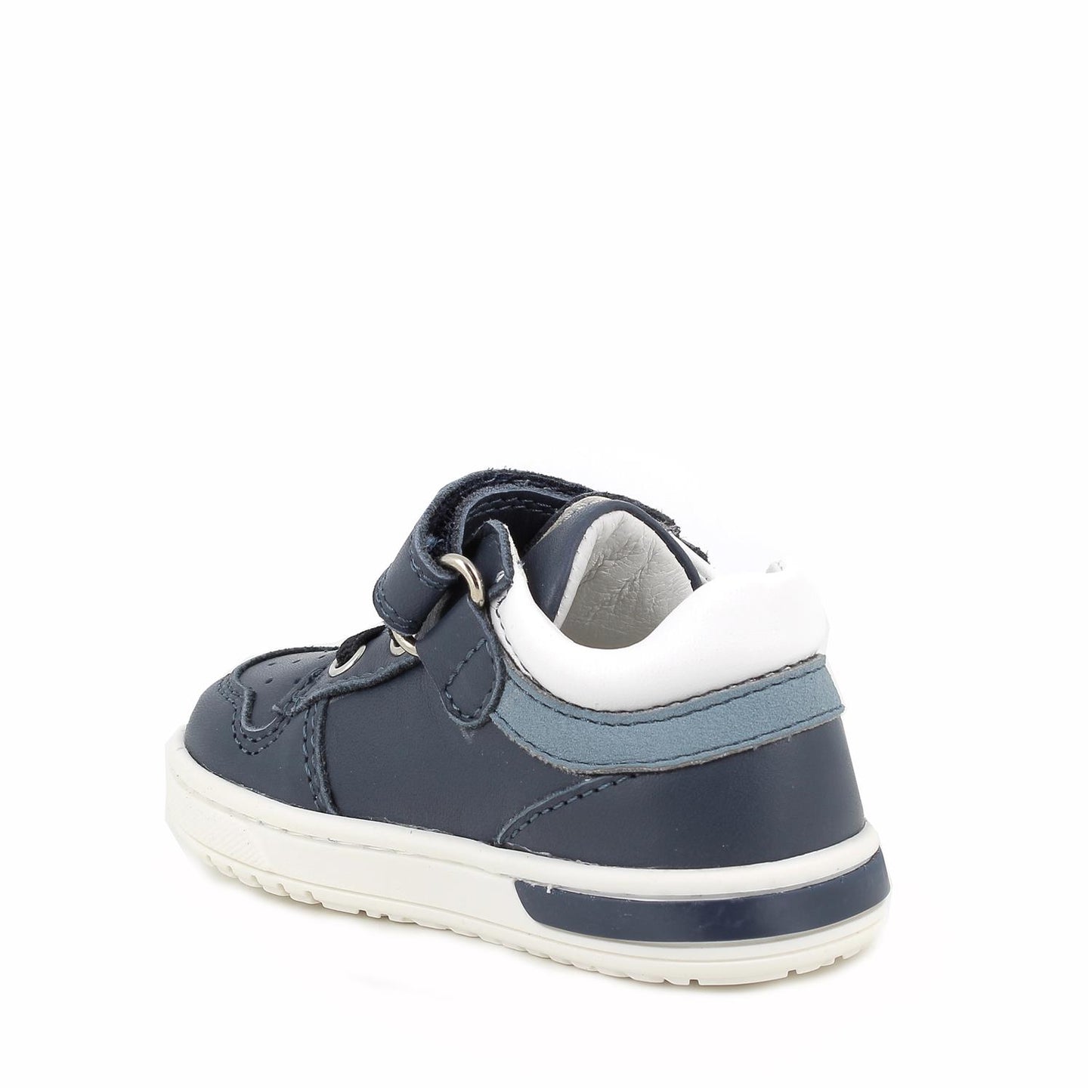 A boys casual shoe by Primigi, style Baby dude in navy, velcro and elastic lace fastening. Right inner side view.
