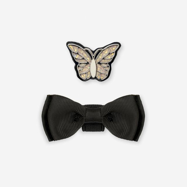 Black bow with butterfly accessory on a white background. LKSO8936