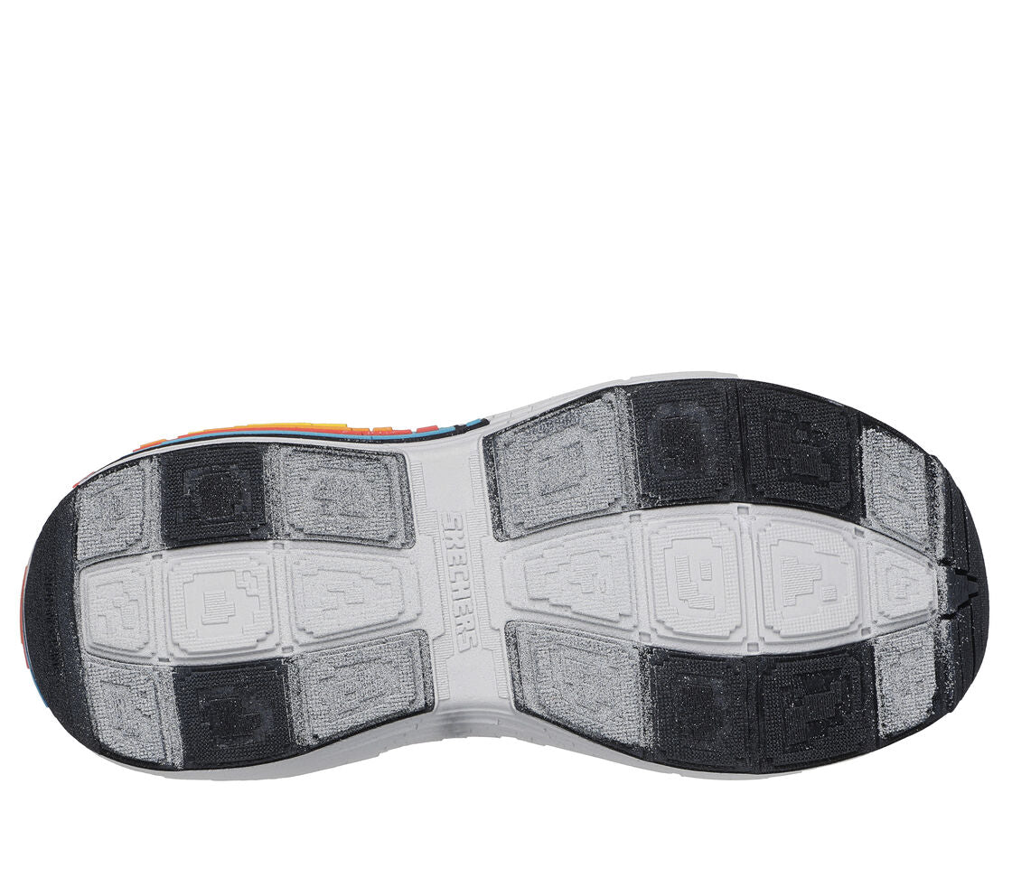 A boys trainer by Skechers, style 402160L Mega Craft 4K, in blue and black multi. Velcro and elastic lace fastening. View of sole.