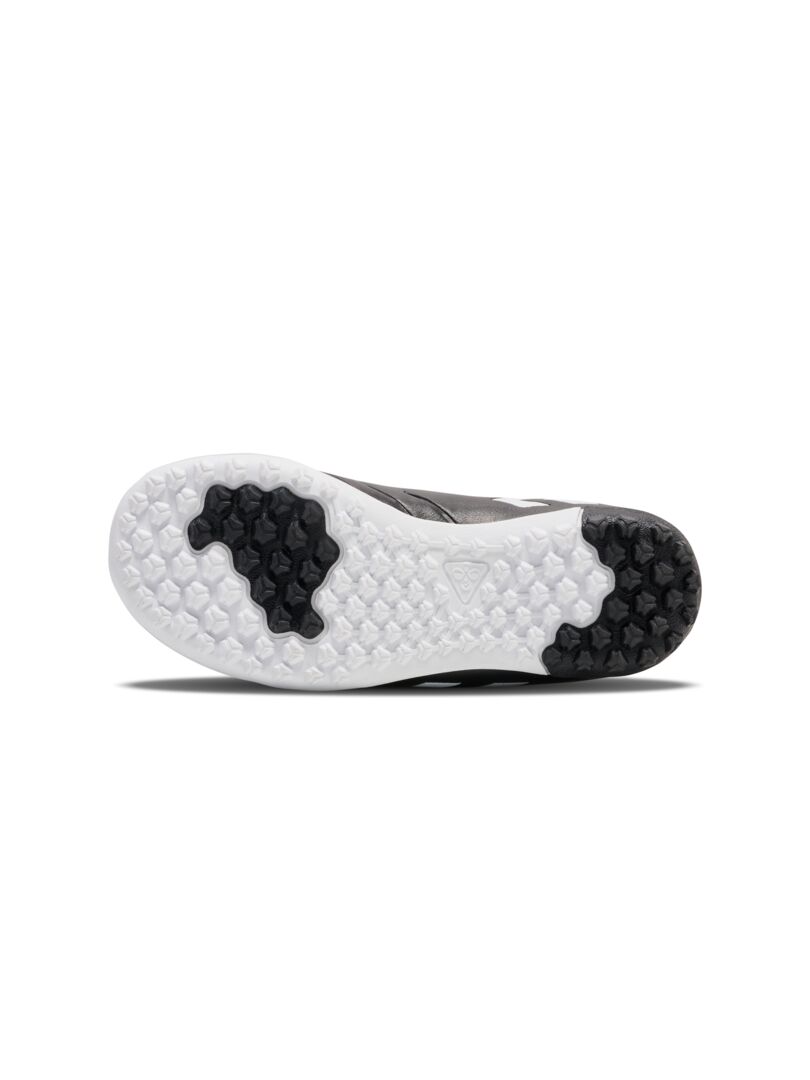 A Astro Turf Football boot by Hummel, style 228343-2042 Top Star Turf JR in black and white with elastic lace and velcro fastening. Vew of sole.