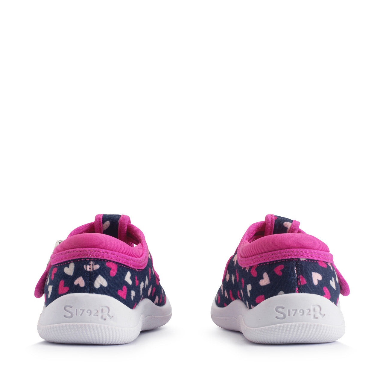 A girls shoe by Start-Rite, style Wriggles T bar, in navy with pink hearts and pink trim. Buckle fastening. Back view of pair.