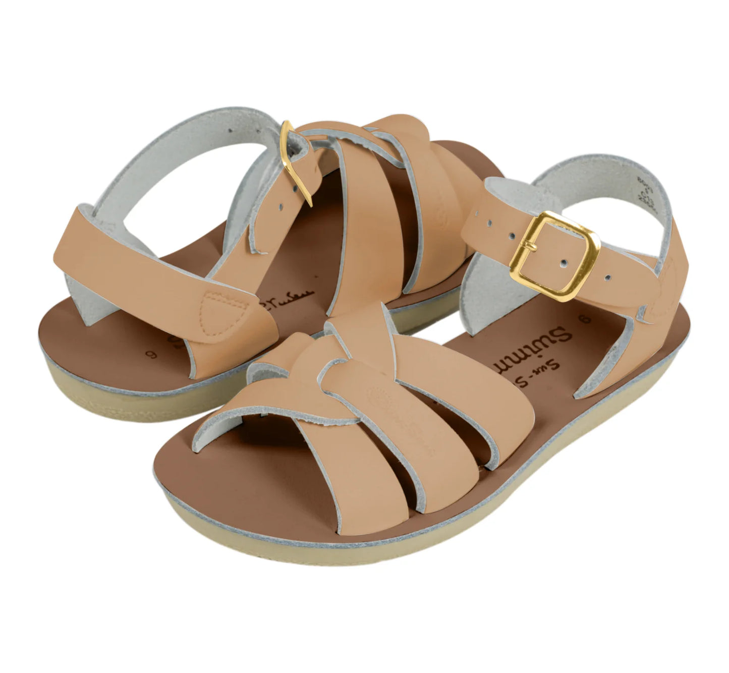 A unisex sandal by Saltwater, style swimmer in Latte with gold buckle strap. View of pair
