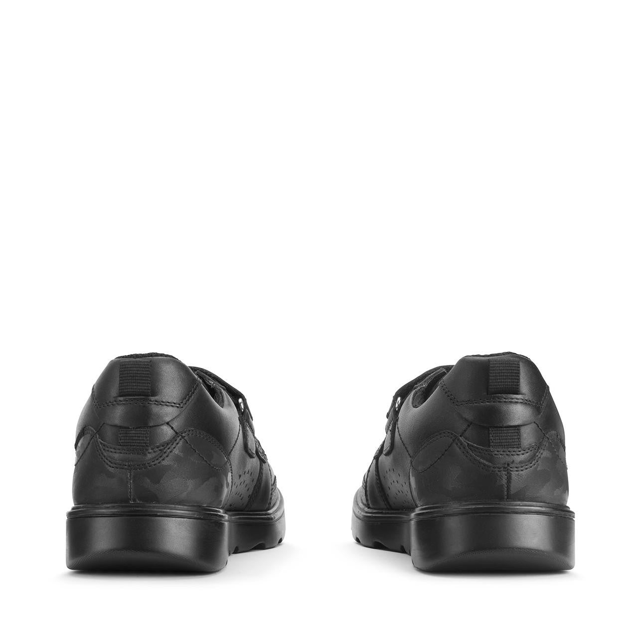 A boys school shoe by Start-Rite, style Mission, in black with double velcro fastening. View of pair from back.