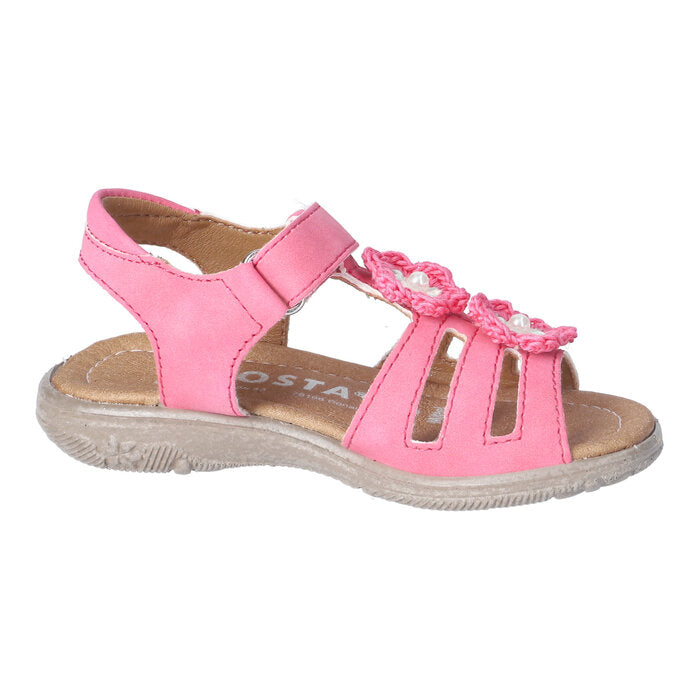 A girls sandal by Ricosta in style Camilla in pink, with crochet flower details and velcro strap. Left inner view