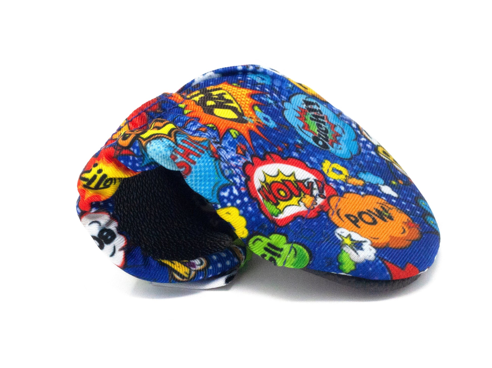 A boys non slip swim shoe by Slipfree, style Superhero, in Royal Blue with onomatopoeia print. Folded view.