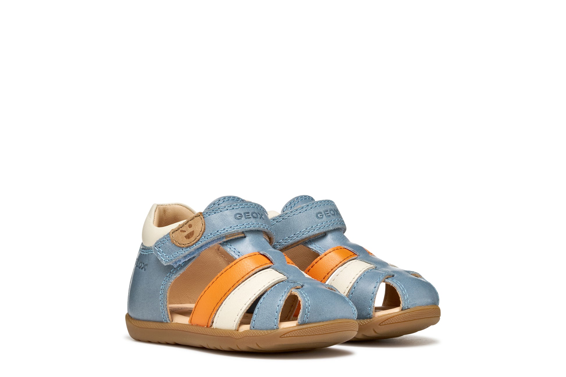 A unisex sandal by Geox, style Macchia in blue. orange and white with velcro strap and face detail on strap. View of pair