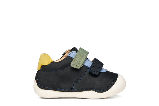 A boys pre-walker shoe by Geox, style Tutim in navy/dark sky with two velcro straps, toe and heel bumpers and yellow, green and blue details. Right side view