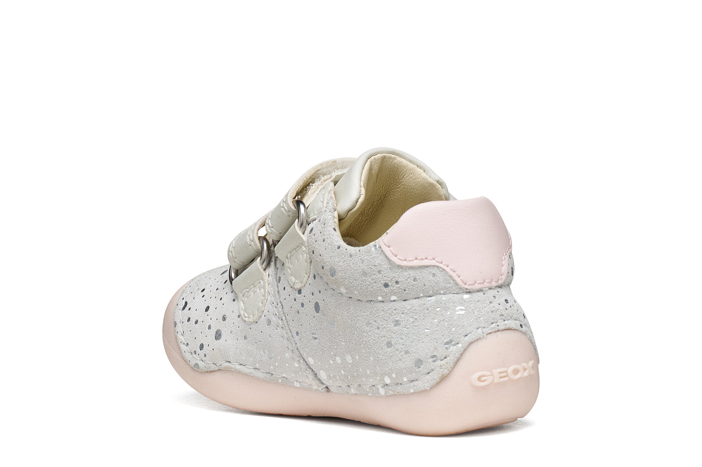 A girls pre-walker shoe by Geox, style Tutim in white/pink with silver speckled design, two velcro straps and toe and heel bumpers. Inner back view