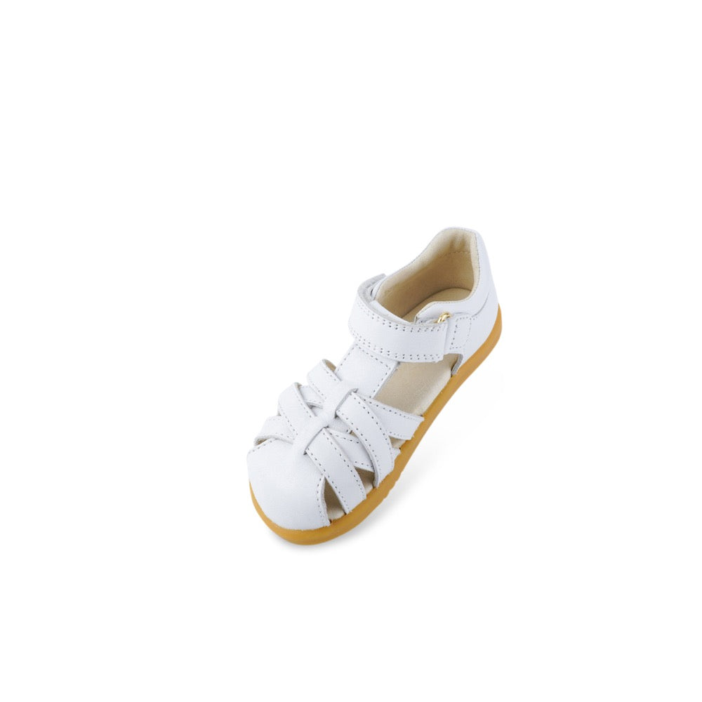A unisex sandal by Bobux, style Roam (I-Walk) in Caramel with velcro strap. Tilted view