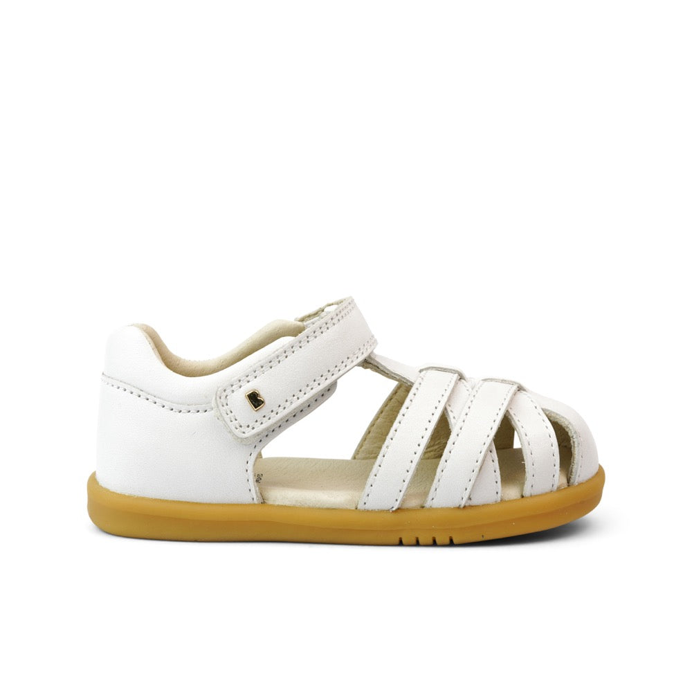A unisex sandal by Bobux, style CrossJump (I-Walk) in white. With velcro strap and light brown role. Right side view