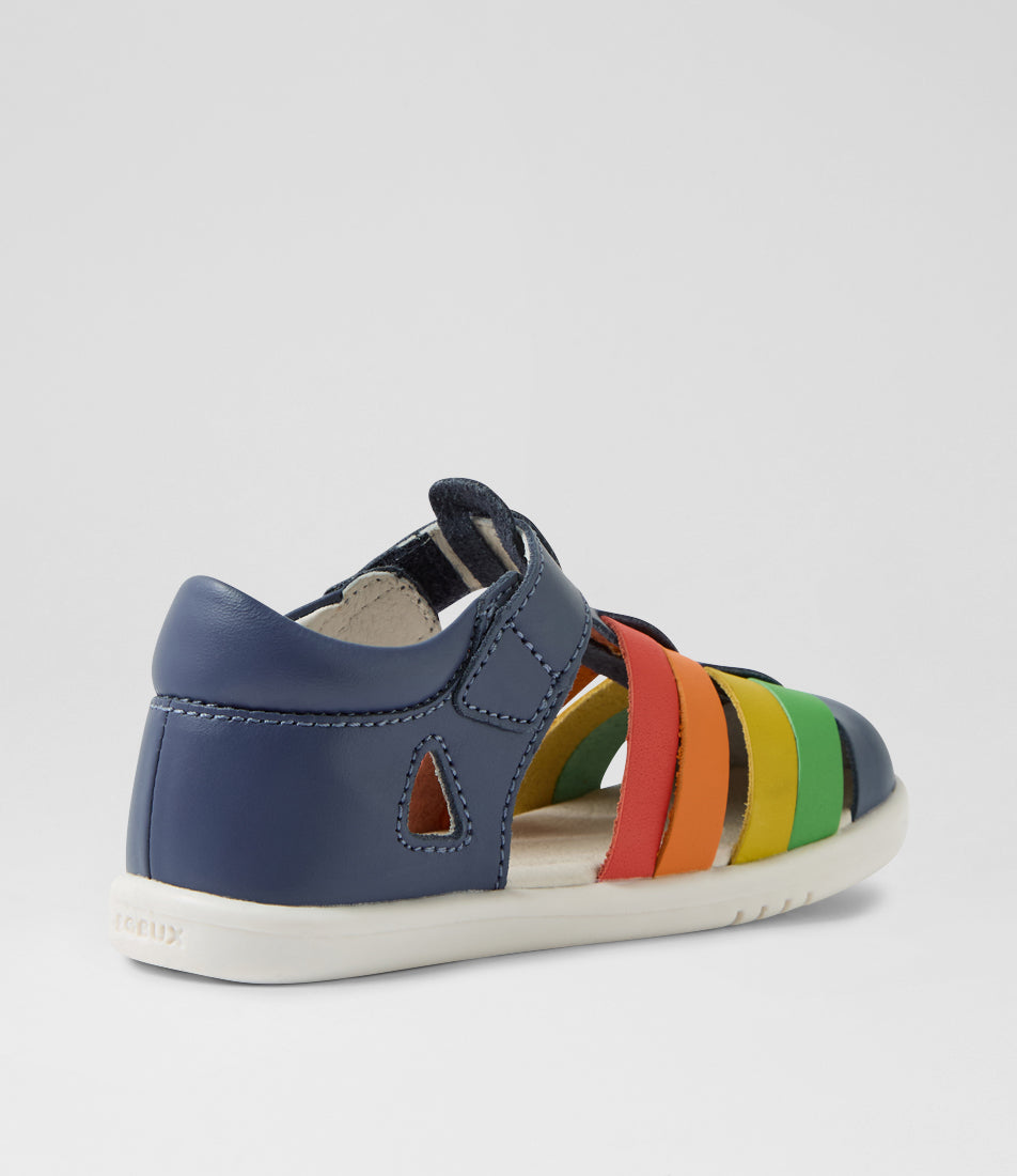 A unisex sandal by Bobux, style Tidal, in Vintage Indigo with velcro strap and rainbow coloured design. Back view