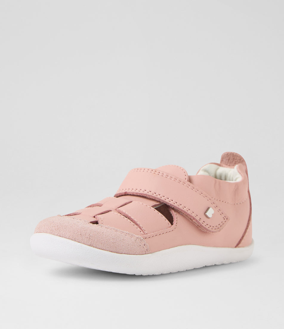 A girls pre-walker shoe, style Maris in pink. Sandal style with velcro strap and elasticated ankle. Angled front view