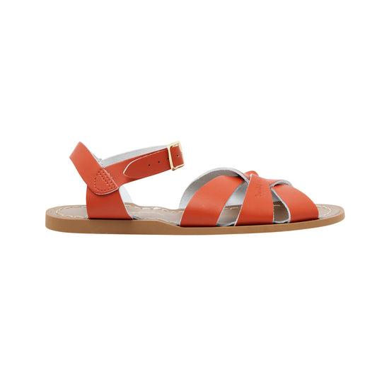 An original girls sandal by Salt Water Sandals in paprika with a single buckle fastening around the ankle. Open Toe and Sling-back with woven detail on the front. Right Side view.