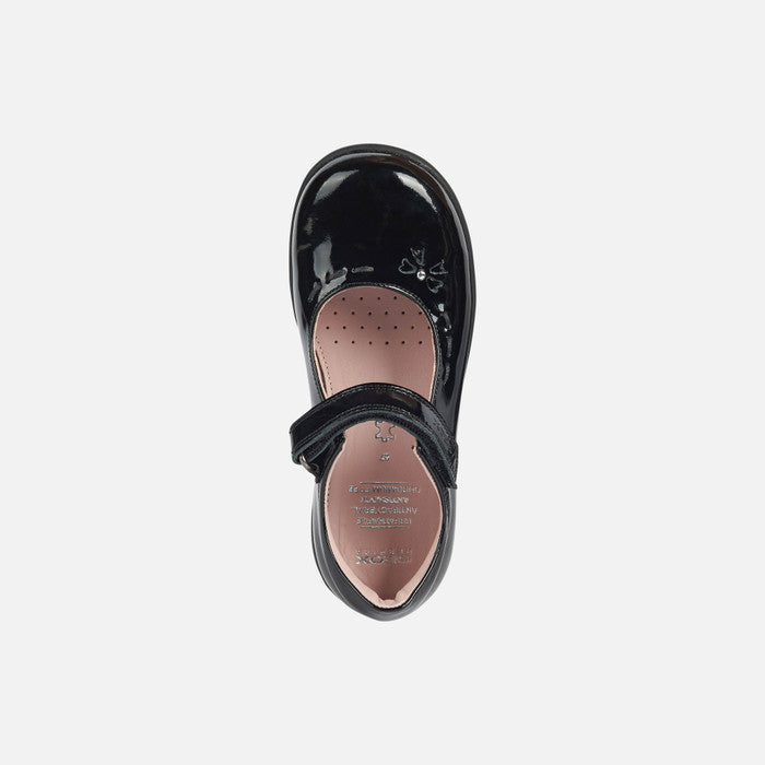 A girls Mary Jane school shoe by Geox, style Naimara, in black patent with velcro fastening. View from above.