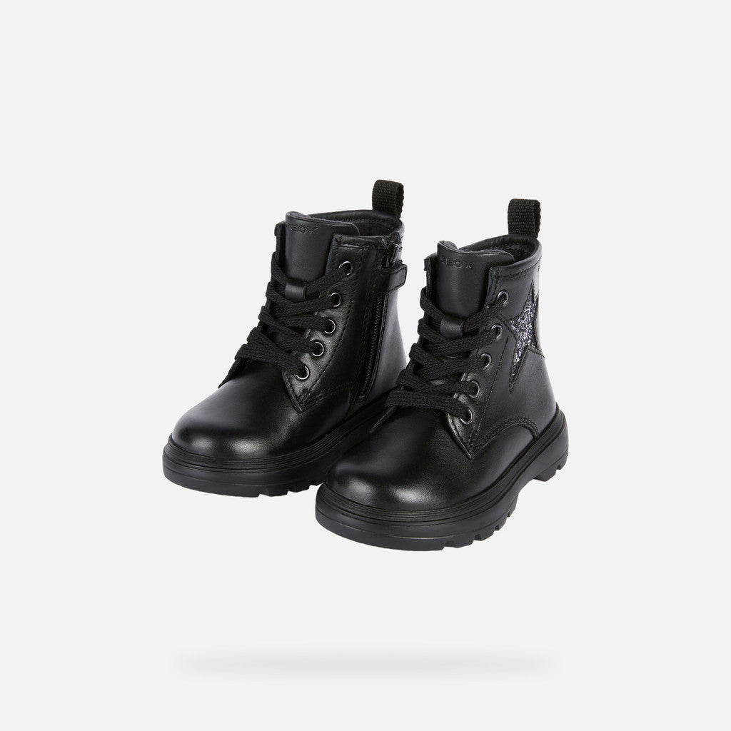 A pair of girls chunky boots by Geox, style B465YA Kiddartah, in black with silver glitter star detail. Zip and lace fastening. Angled left side view.