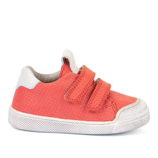 A girls casual shoe by Froddo, style Rosario G2130316-30, in coral leather with gold polka dots and white trim.
Toe bumper and velcro fastening. Right side view.