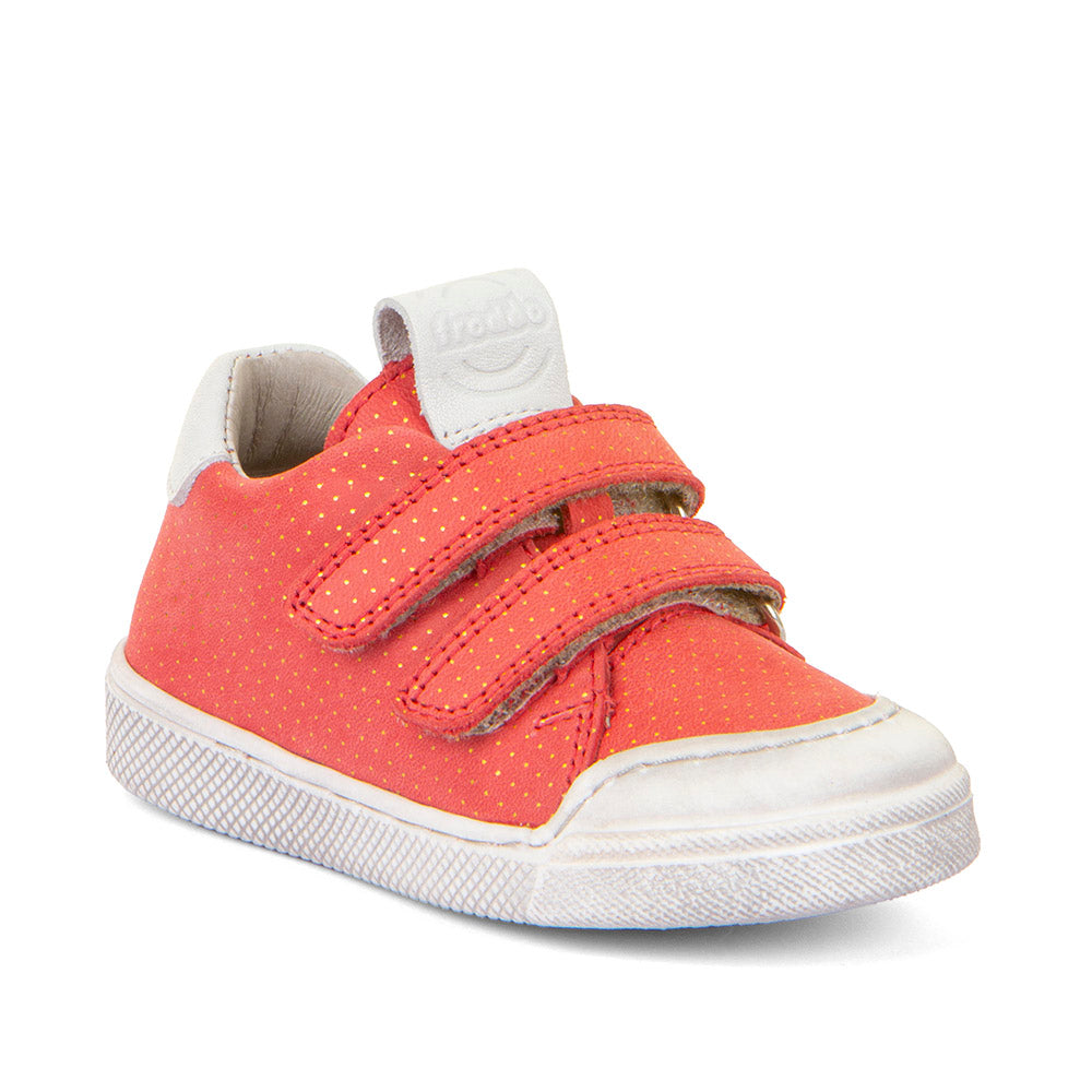 A girls casual shoe by Froddo, style Rosario G2130316-30, in coral leather with gold polka dots and white trim.
Toe bumper and velcro fastening. Angled right side view.