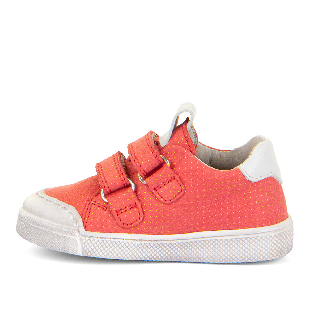A girls casual shoe by Froddo, style Rosario G2130316-30, in coral leather with gold polka dots and white trim.
Toe bumper and velcro fastening. Left side view.