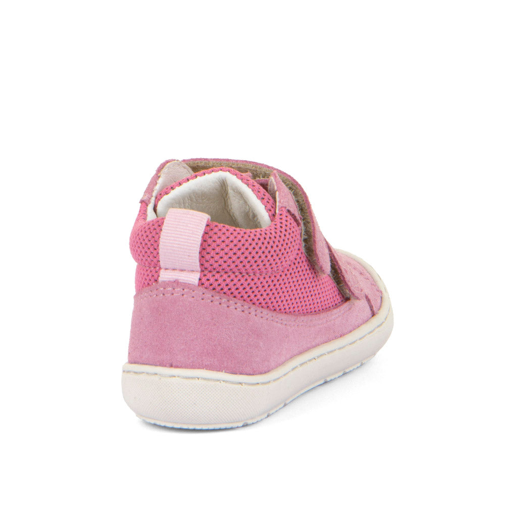 A girls ankle boot by Froddo, style Ollie Fun G2130345-3 in pink textile/suede with toe bumper and double velcro fastening. Angled back view.