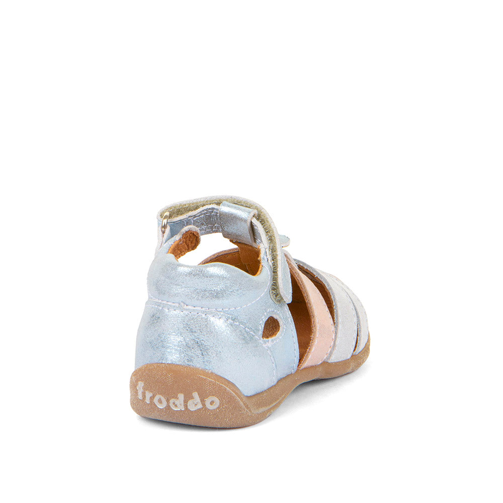 A girls leather sandal by Froddo, style Carte Girly, in blue and pink metallic leather with single velcro fastening. Back view.