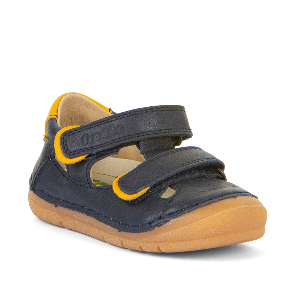 A boys closed toe sandal by Froddo, style Paix Double G2150198, in blue with yellow trim and double velcro fastening. Angled view.