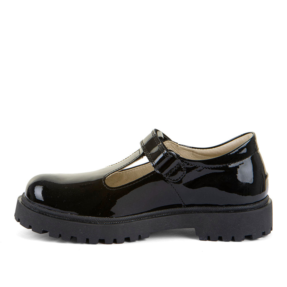 A girls school shoe by Froddo, style Lea T in black patent, with velcro tbar strap and chunky black sole. Inner right side view