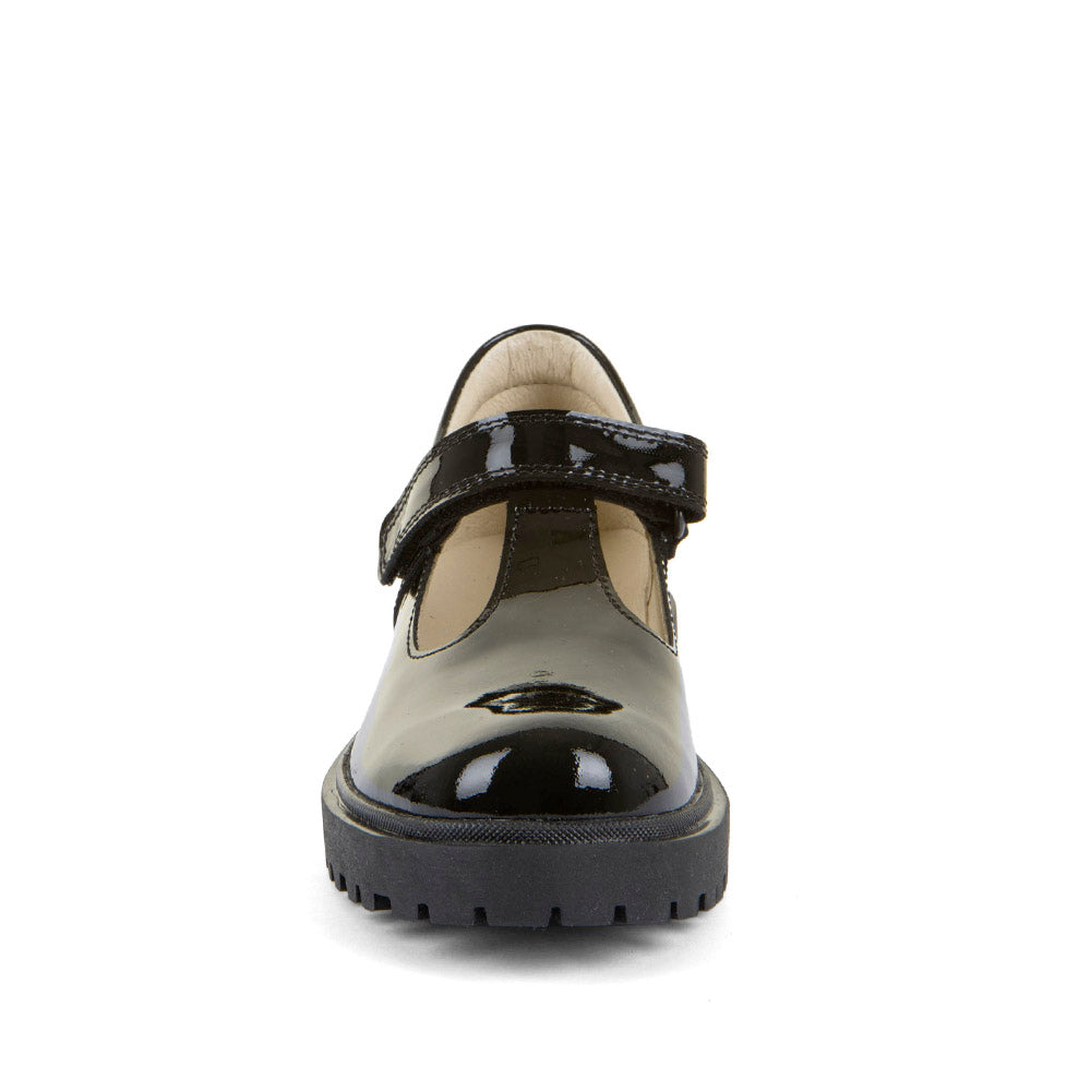 A girls school shoe by Froddo, style Lea T in black patent, with velcro tbar strap and chunky black sole. Front view