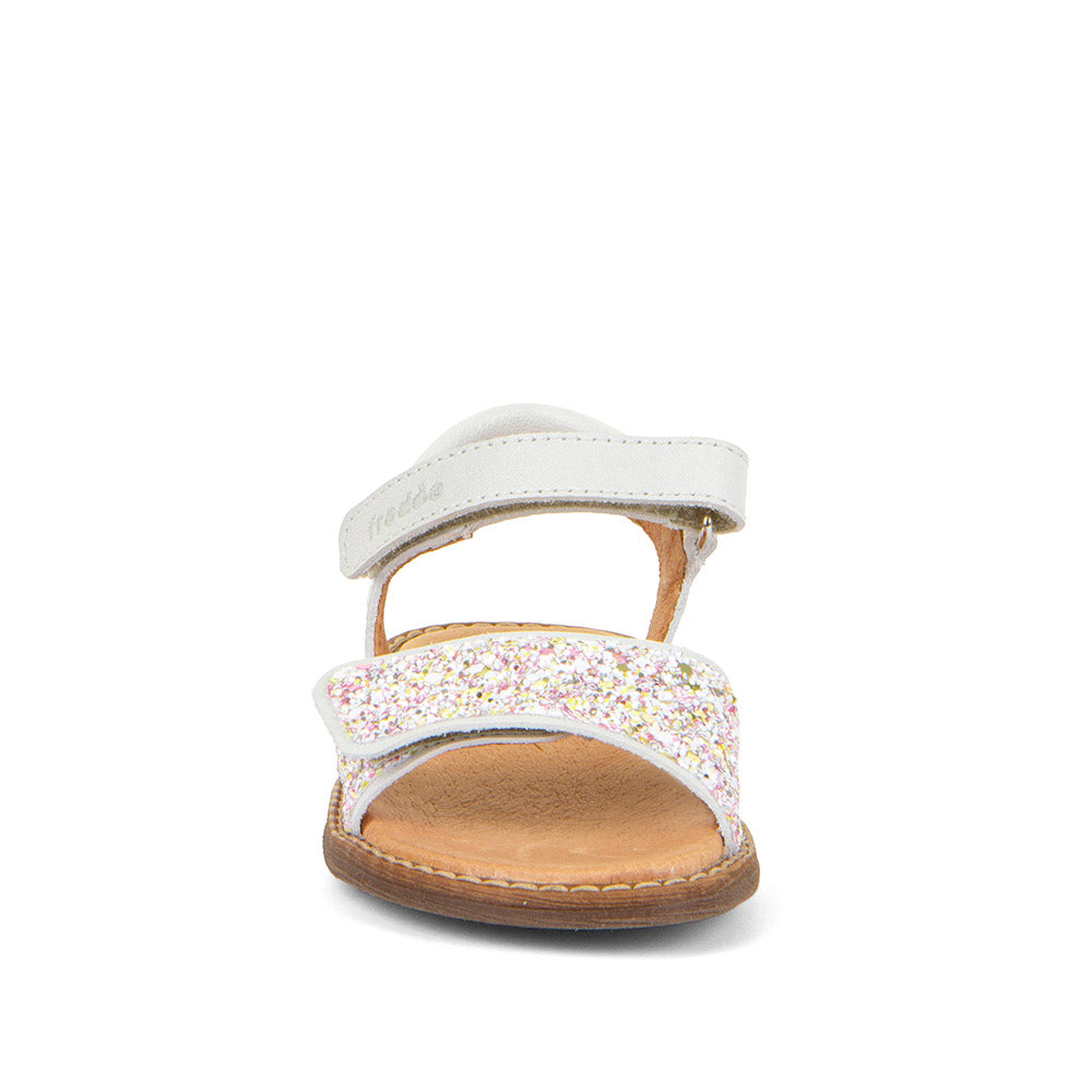 A girls sandal by Froddo, style Lorine Sparkle in with two velcro straps, one on the ankl and one large one at front with glitter detail. Front view