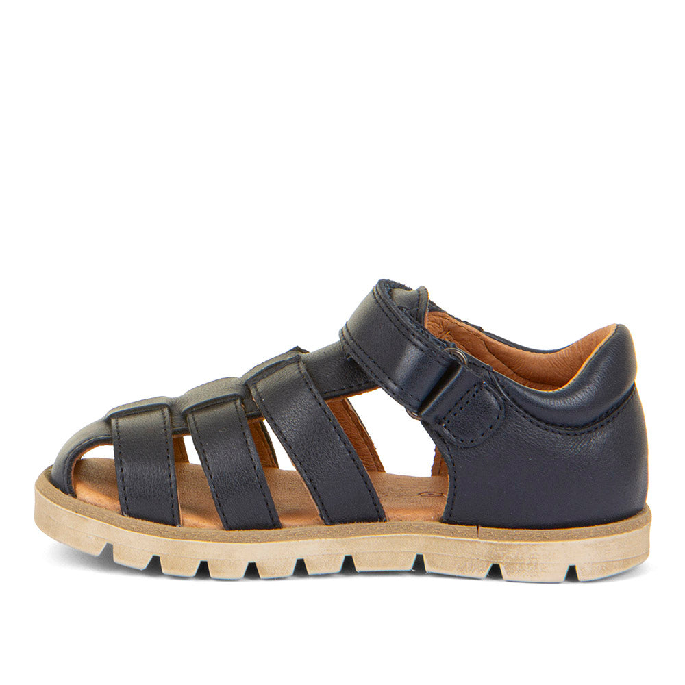 A unisex closed toe sandal by Froddo,style Keko G3150287 in navy with velcro fastening. Left side view.