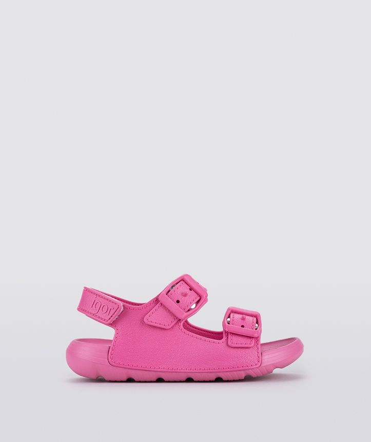 A girls sling back rubber shoe by Igor, style Maui in fucsia with two buckle straps and velcro heel fastening. Right side view.